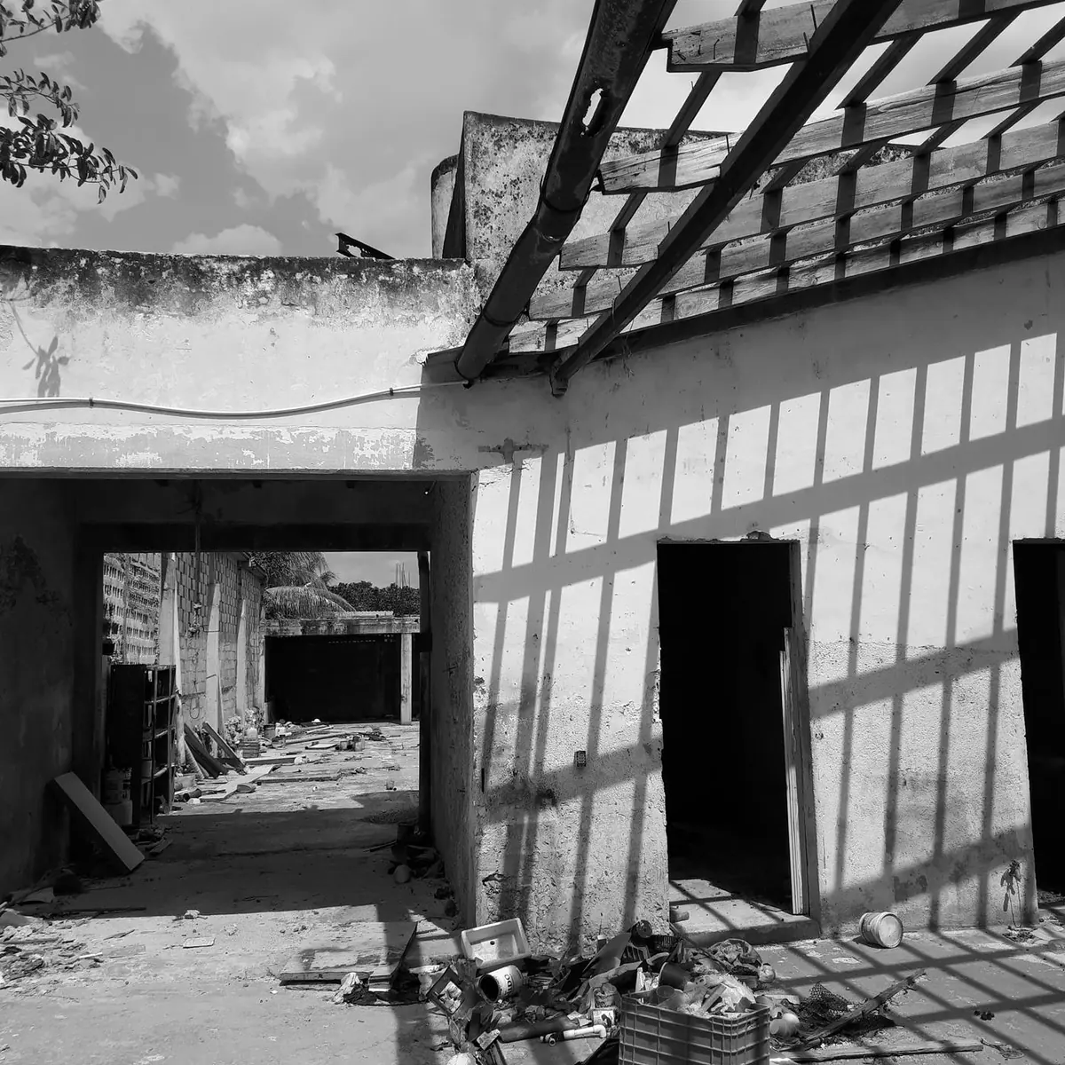Interior courtyard before renovation, with roof structure exposed
